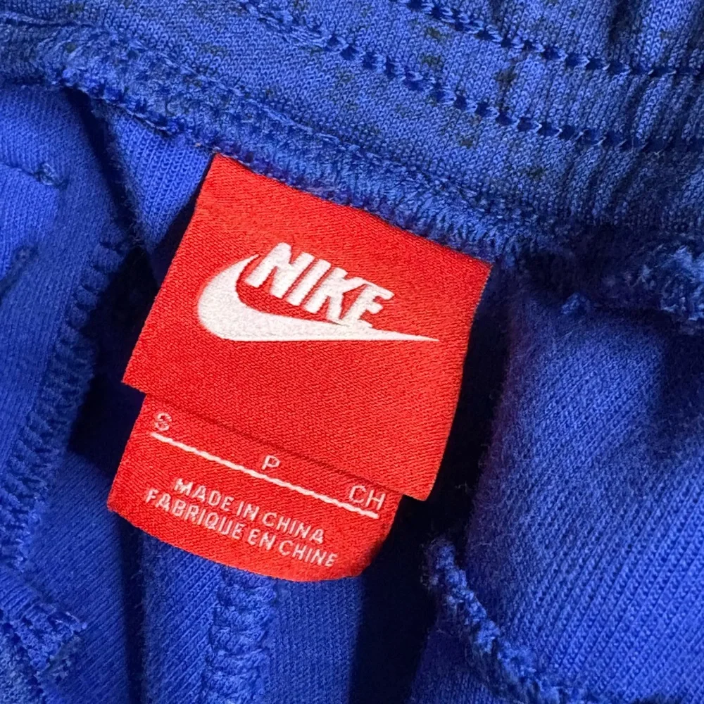 Nike Tech Fleece cuffed sweatpants in blue And Black Size S